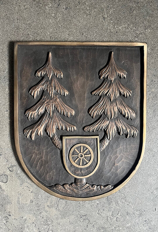 Wappen mit Bäumen